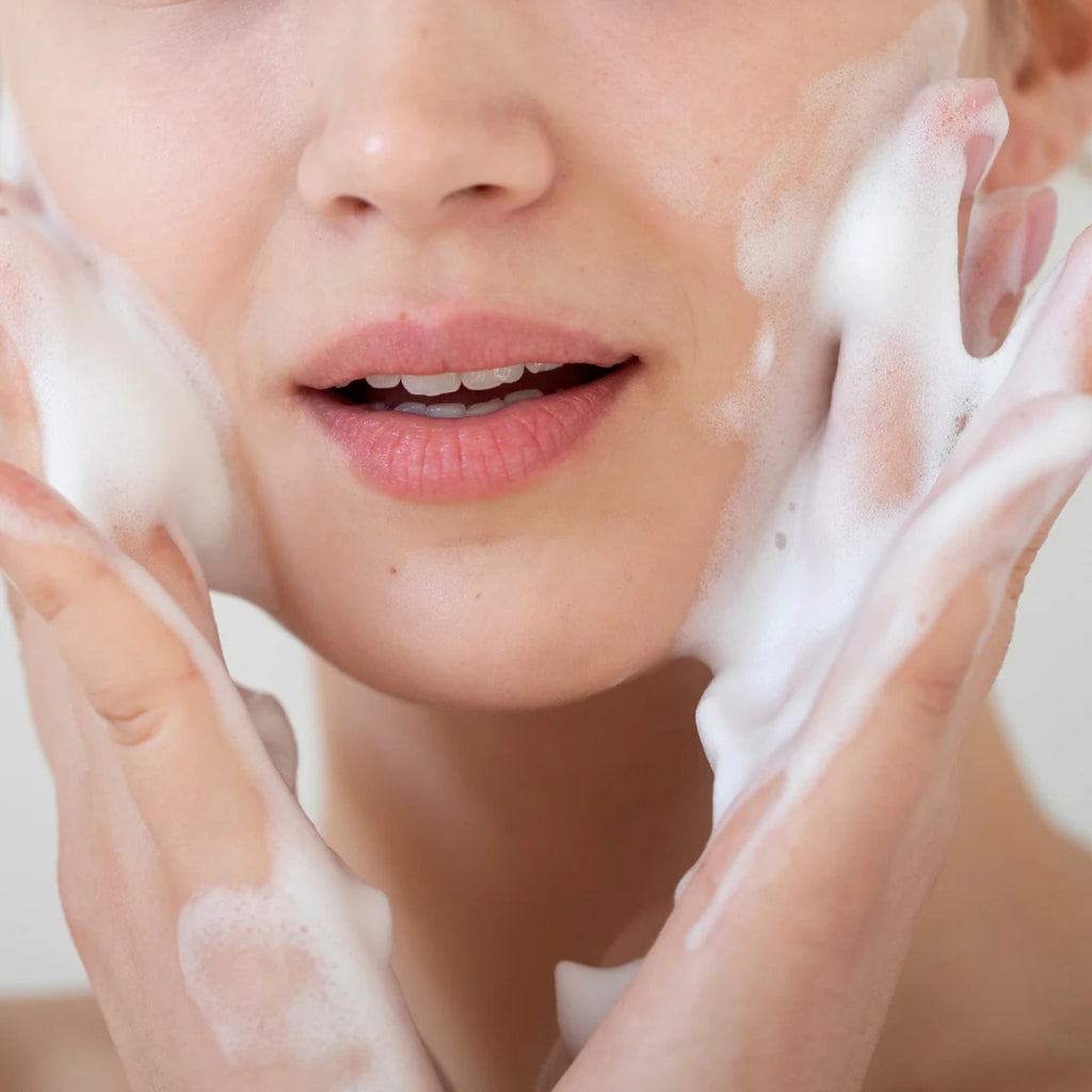 Conatural Rice Face Wash and Scrub for glowing skin gentle exfoliating cleanser Pakistan girl applying