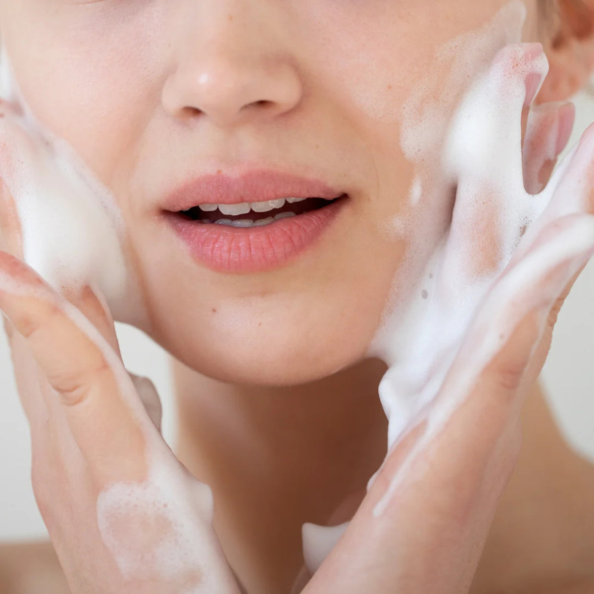 Conatural Rice Face Wash and Scrub for glowing skin gentle exfoliating cleanser Pakistan girl applying