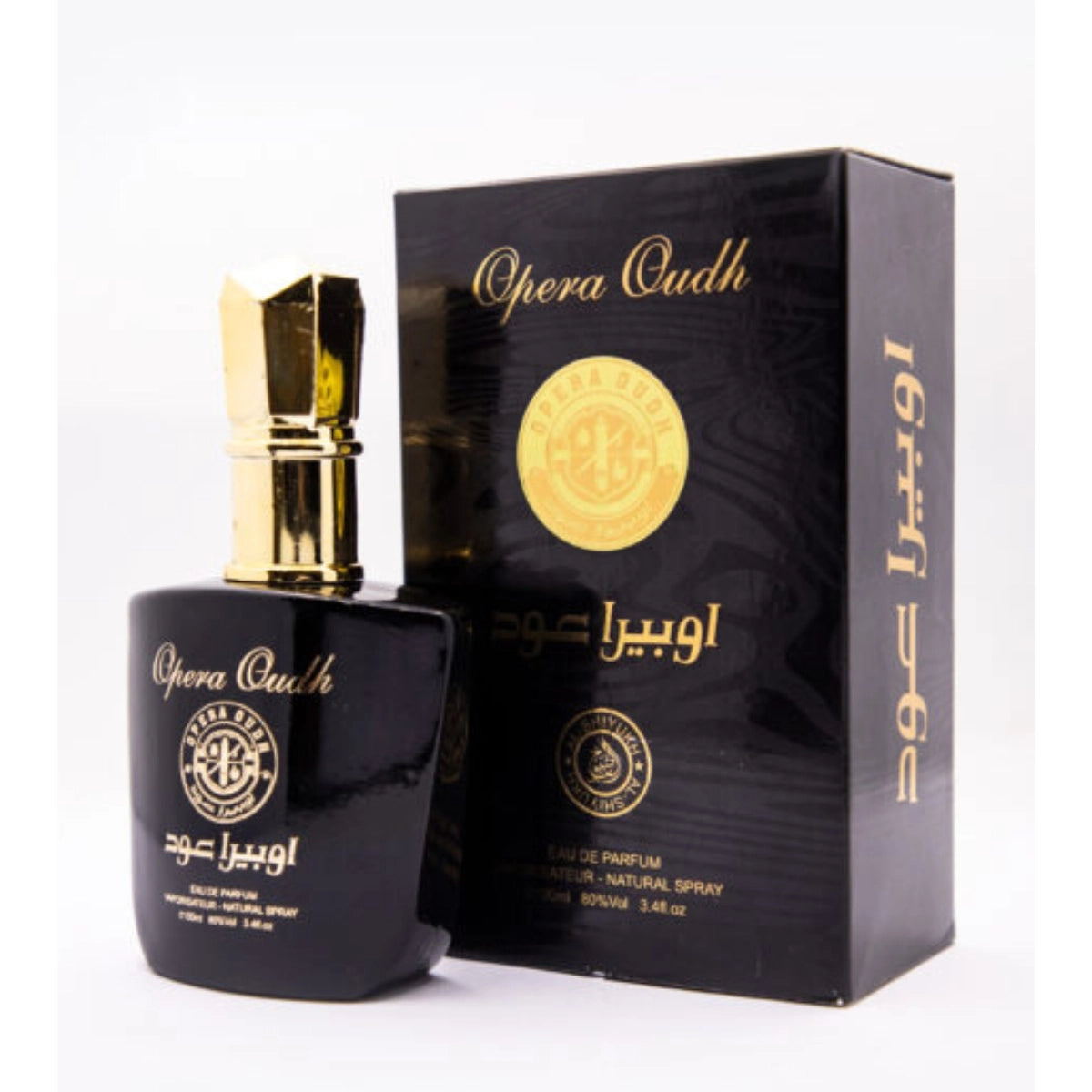 Black perfume bottle and packaging with gold accents on a white background